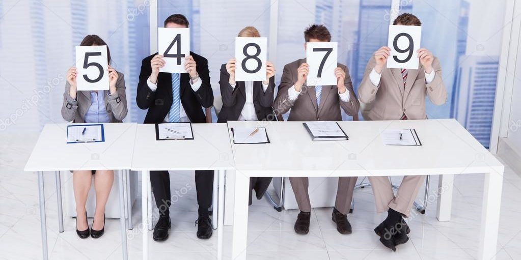 Business People Showing Score Cards